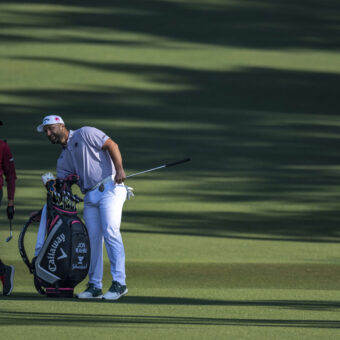 Masters champion Sergio Garcia of Spain and Masters champion Jon Rahm of Spain on the fairway on the No. 2 hole during the final round of the Masters at Augusta National Golf Club, Sunday, April 12, 2026.