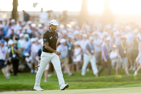 NEWTOWN, PENNSYLVANIA - MAY 17: Aaron Rai of England walks the 18th green during the final round of the PGA Championship at Aronimink Golf Club on May 17, 2026 in Newtown, Pennsylvania. (Photo by Michael Reaves/Getty Images)