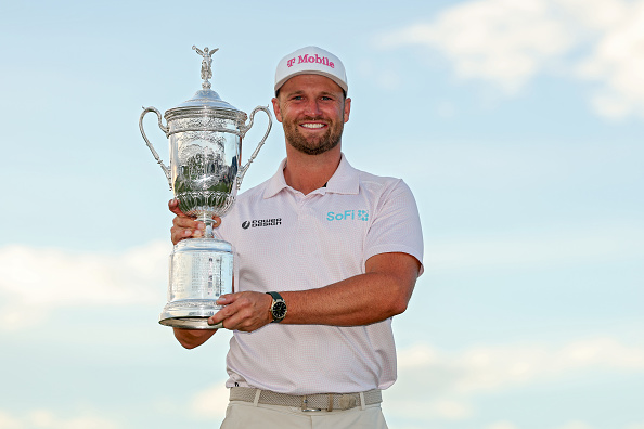 SOUTHAMPTON, NEW YORK - JUNE 21: Wyndham Clark of the United States poses with the U.S. Open Championship Trophy after winning the 126th U.S. OPEN at Shinnecock Hills Golf Club on June 21, 2026 in Southampton, New York. (Photo by Christian Petersen/Getty Images)