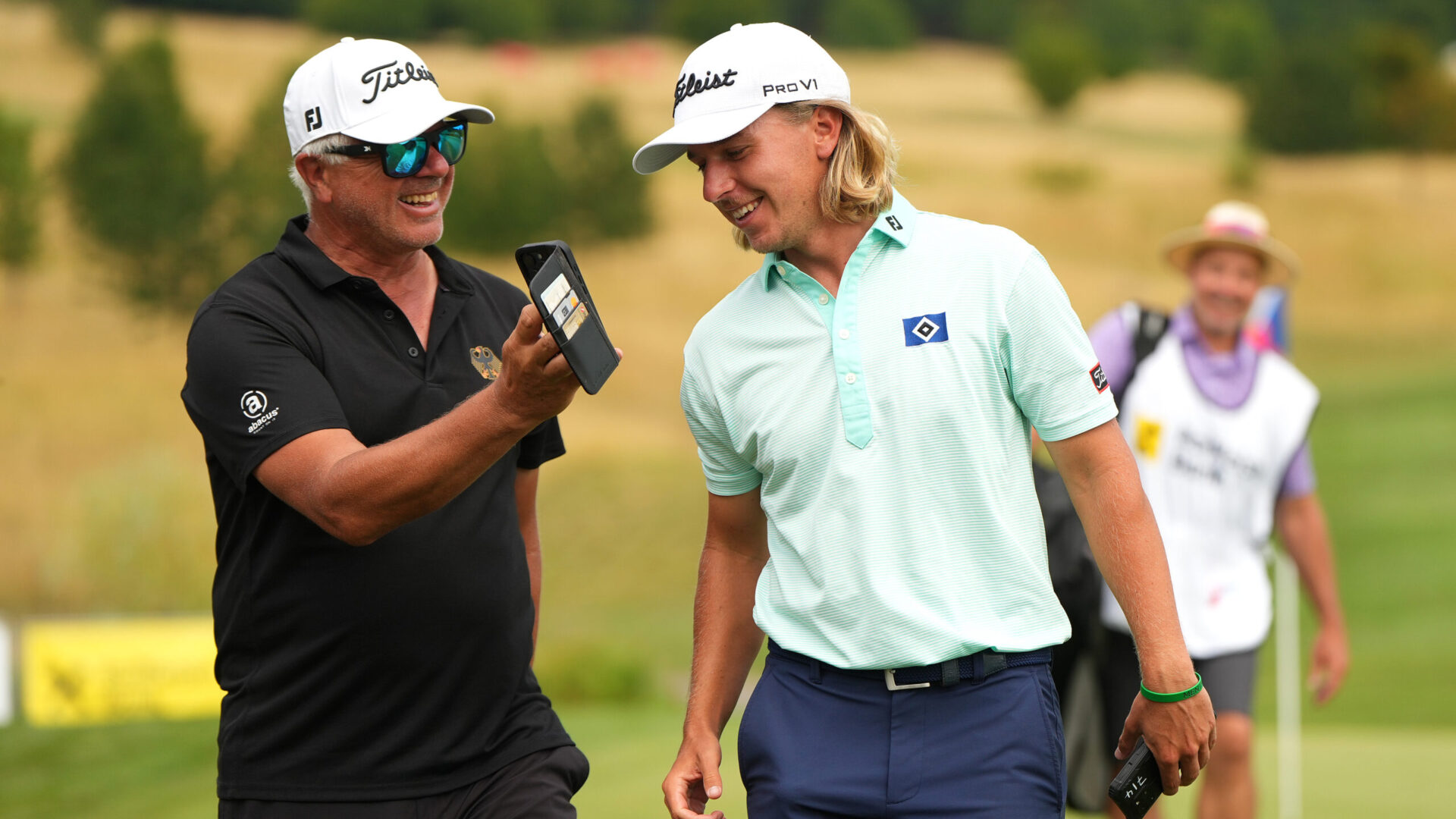 BRNO, CZECH REPUBLIC - JULY 26: Anton Albers of Germany reacts with a team member after winning the Raiffeisenbank Golf Challenge 2026 at Kaskáda Golf Resort on July 26, 2026 in Brno, Czech Republic. (Photo by Alex Bierens de Haan/Getty Images)
