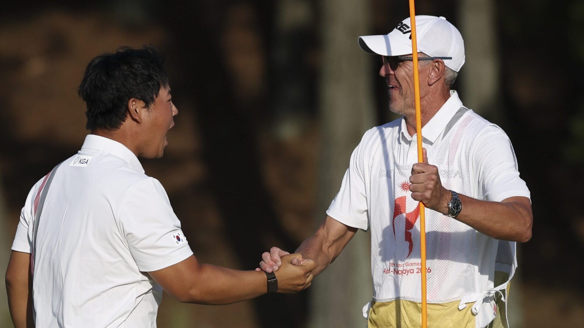 KASUGAI, JAPAN - OCTOBER 03: Joohyung Kim(Tom Kim) of South Korea celebrates after winning gold during the Golf Men's final round of the 20th Asian Games Aichi-Nagoya at Kasugai Country Club East Course on October 03, 2026 in Kasugai, Aichi, Japan. (Photo by Zhe Ji/Getty Images)