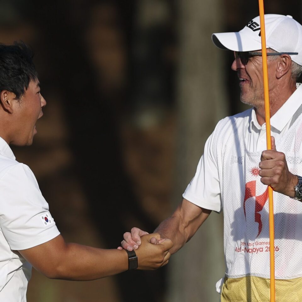 KASUGAI, JAPAN - OCTOBER 03: Joohyung Kim(Tom Kim) of South Korea celebrates after winning gold during the Golf Men's final round of the 20th Asian Games Aichi-Nagoya at Kasugai Country Club East Course on October 03, 2026 in Kasugai, Aichi, Japan. (Photo by Zhe Ji/Getty Images)